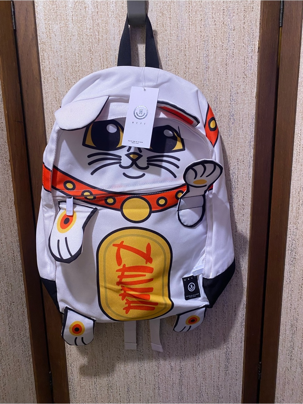 Neff White Backpack with Yellow & Orange Maneki Neko Design